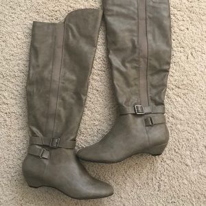 Thigh high heeled boots